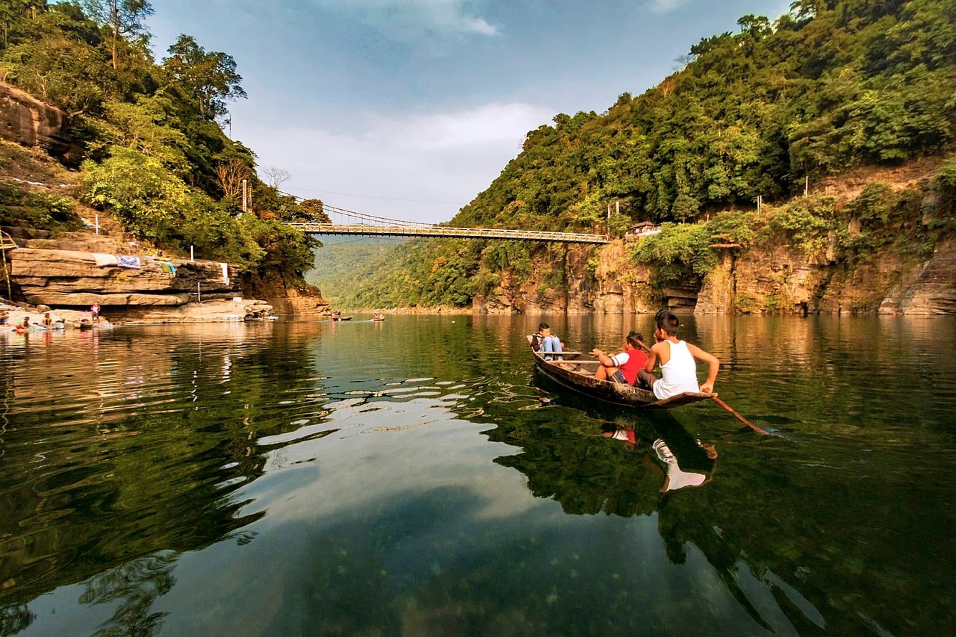 Boats on the clear water of the Umngot river at Dawki, Meghalaya